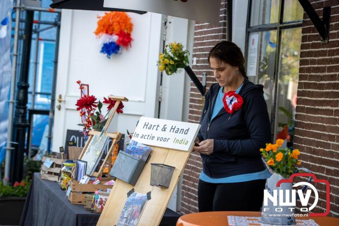 Volle terrassen, bruisende kleedjesmarkt en sportieve Wallenloop: Elburg leeft tijdens koningsdag! - &copy; NWVFoto.nl
